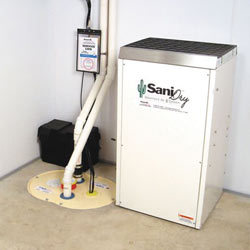 Sump pump system, dehumidifier, and basement wall panels installed during a sump pump installation in Bauxite