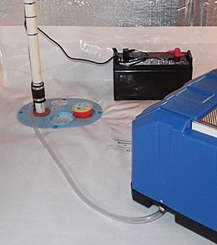 Closeup of a crawl space sump pump installed in Greenbrier