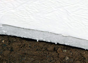 Insulation installed on a crawl space floor in Roland