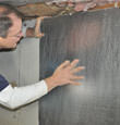 installation steps for crawl space insulation in a crawl space in Roland