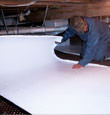 Greenbrier insulation being installed in a crawl space.