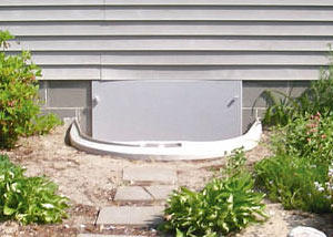 Rigid plastic crawl space access well installed in a Benton crawl space