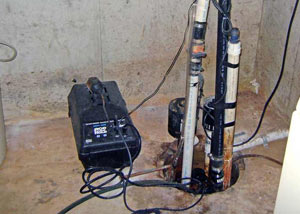 Pedestal sump pump system installed in a home in Traskwood