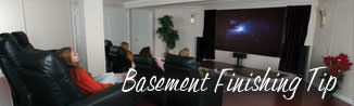 a waterproofed basement that has been finished into a family room in Maumelle