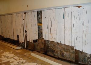 A wet, flooded finished basement in Casa