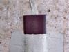 A basement wall covering for creating a vapor barrier on basement walls in Benton