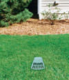 A buried gutter drain downspout extension installed in a Little Rock home