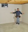 Greenbrier basement insulation covered by EverLast™ wall paneling, with SilverGlo™ insulation underneath