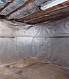An energy efficient radiant heat and vapor barrier for a Little Rock basement finishing project