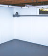 Benton, AR wet basement wall covering that tucks into a perimeter drainage system